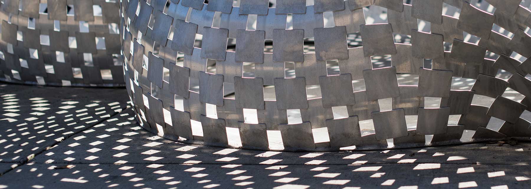 detail of a metal fabric-like sculpture on the UA campus